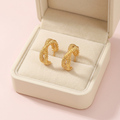 Boucles Iris — bijou offert Meyvra